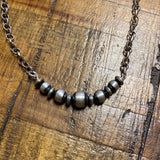 Rolling Stone Necklace